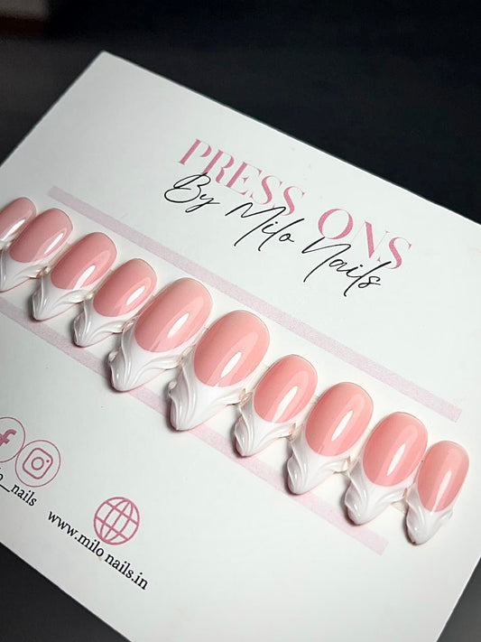 French nail with embosed swirls