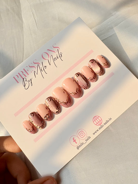 Rose gold cat eye nails