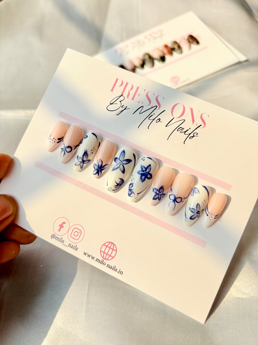 white blue flower nails