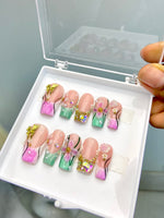 Sage green studded nails