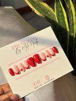 Red tips with heart nails