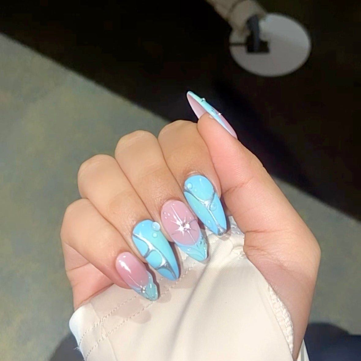 Sea Blue aura nails with droplets