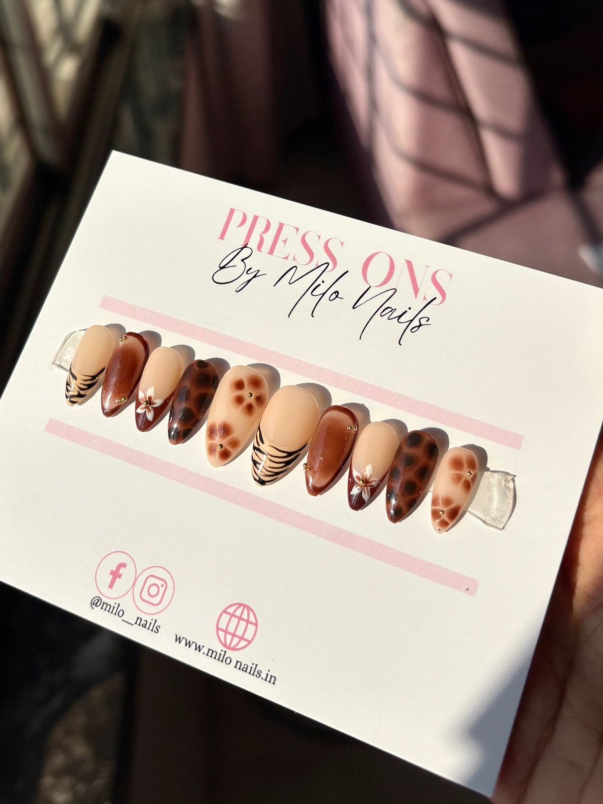 Brown flower with printed nails