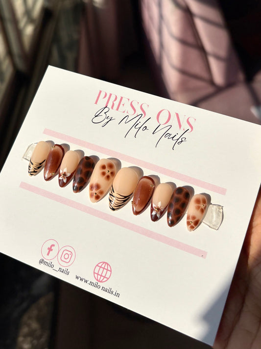 Brown flower with printed nails