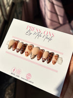 Brown flower with printed nails