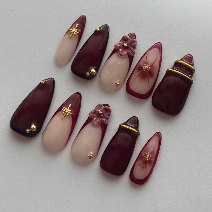 Maroon flower with printed nails