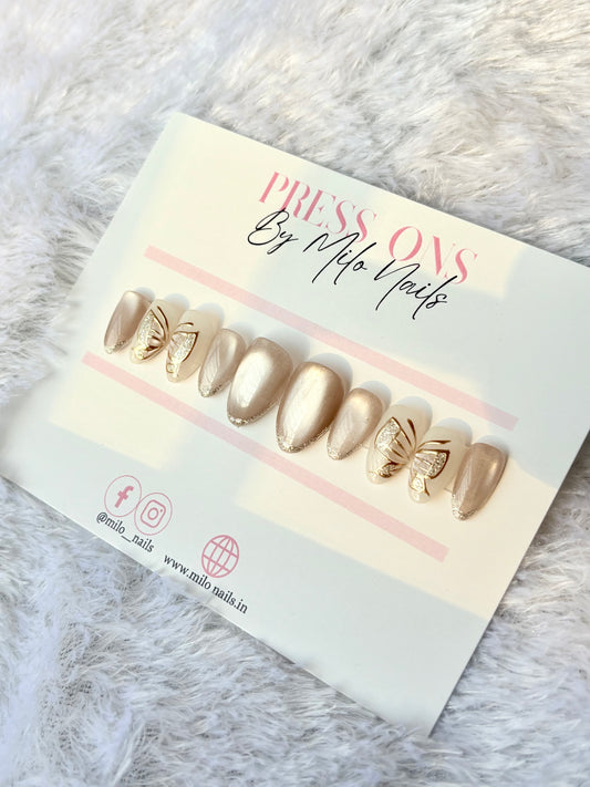 Butterfly nude chrome nails