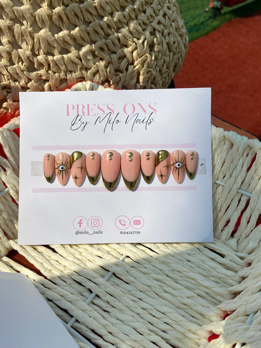 Golden metallic evil eye