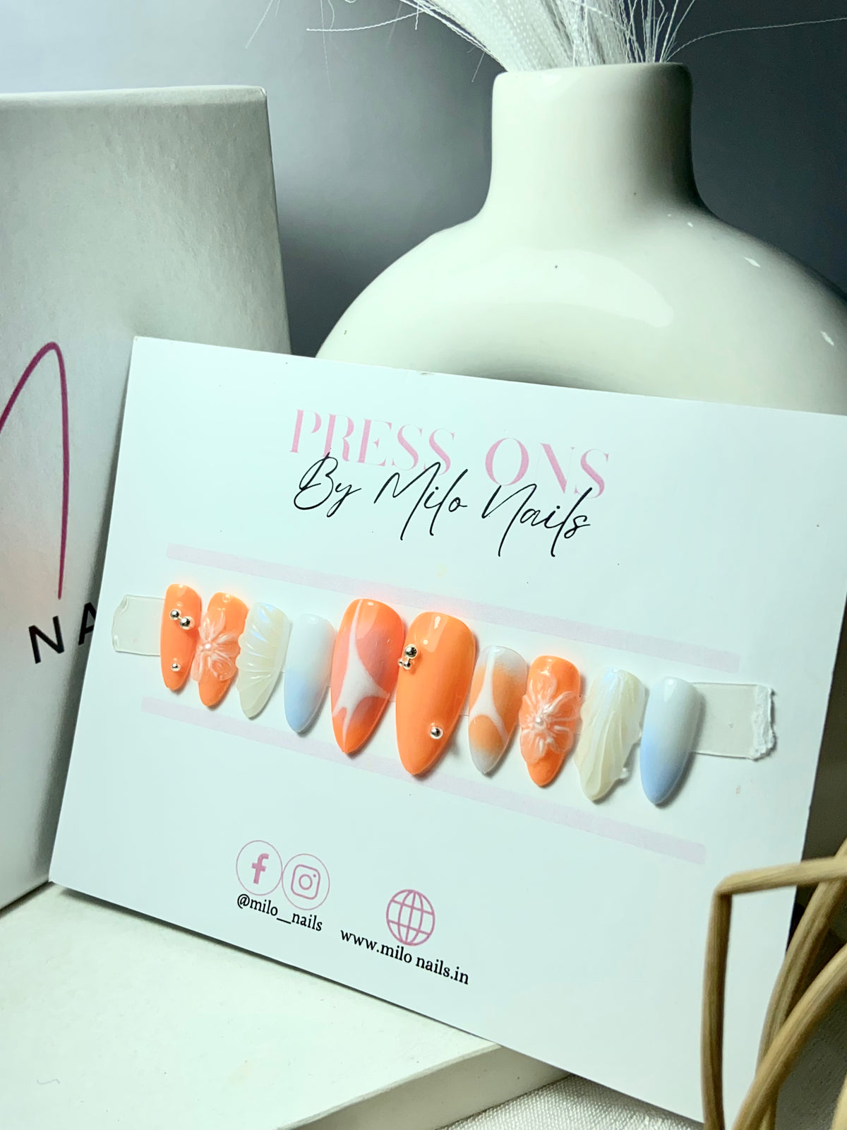 Y2K orange nails