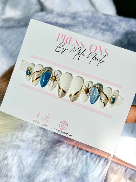 White - blue cat eye nails