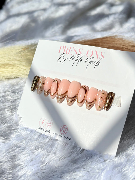 Nude chrome pearl nails