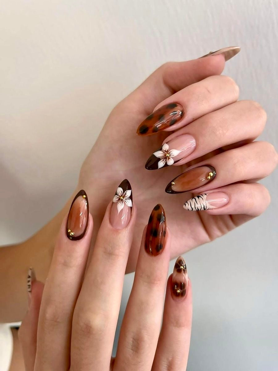 Brown flower with printed nails