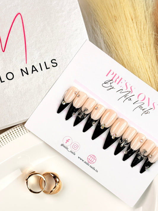 Black tips with cross