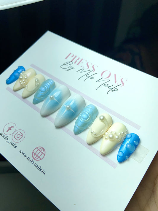 Aqua blue metallic nails