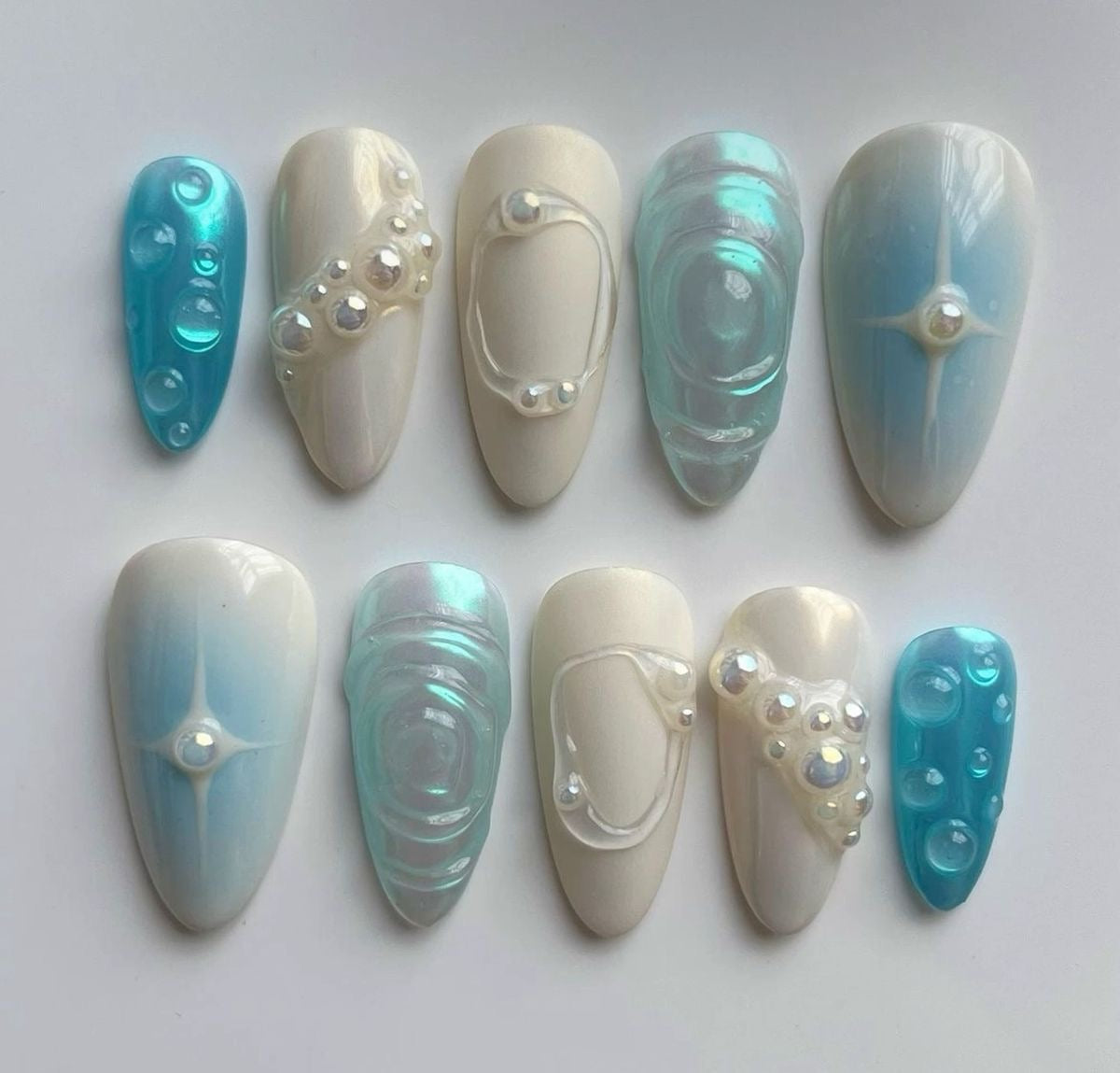 Aqua blue metallic nails