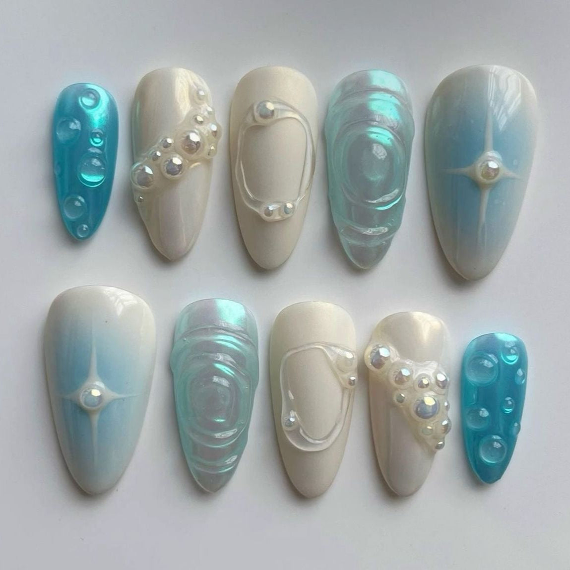 Aqua blue metallic nails