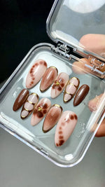 Brown greek metallic nails