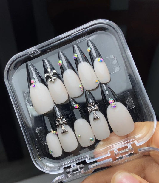 Black tips with cross