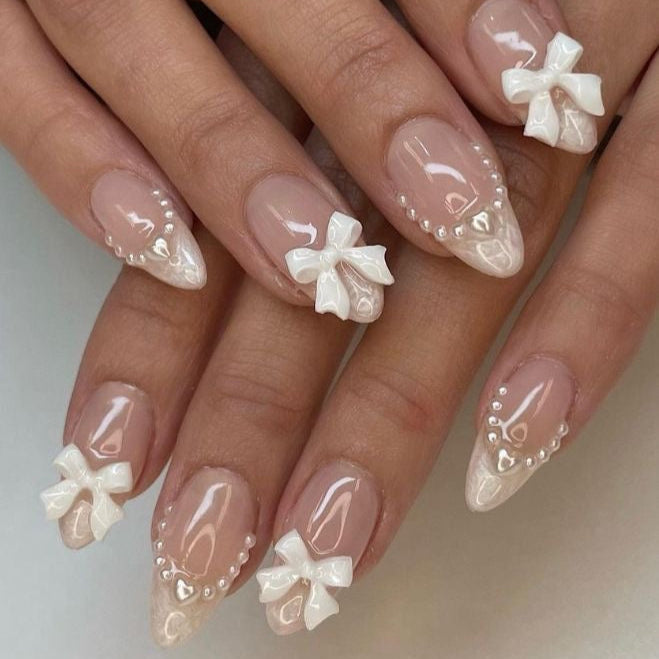 Bows with pearls french nails