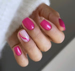 Hot pink nails with swirls