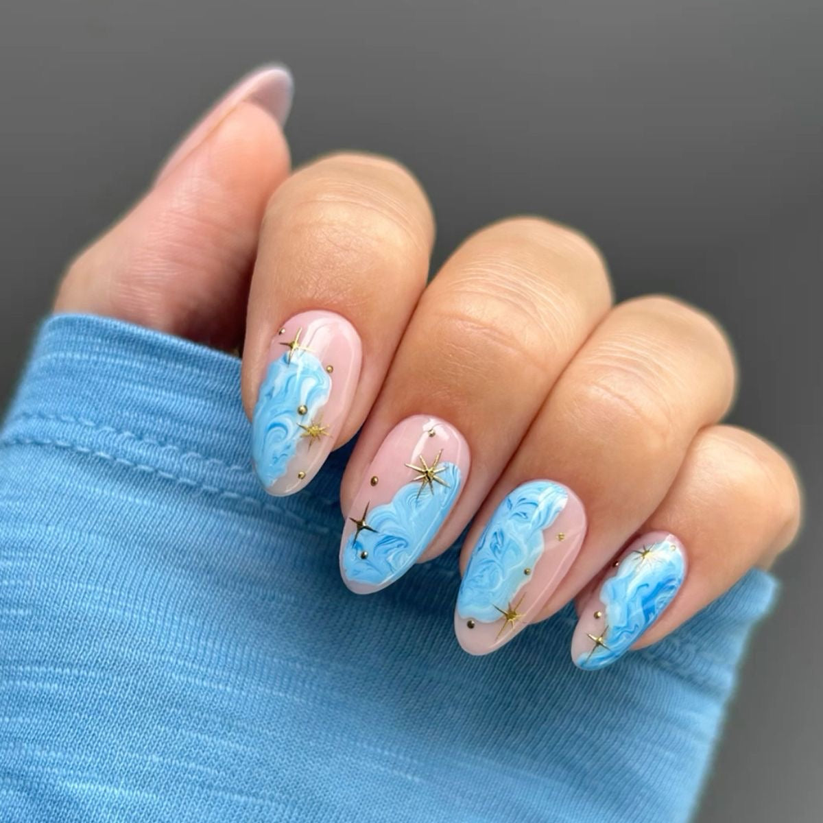 Marble nails with chrome stars