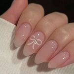Nude minimal bow nails
