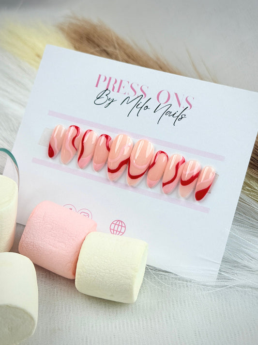 Red & pink swirl nails