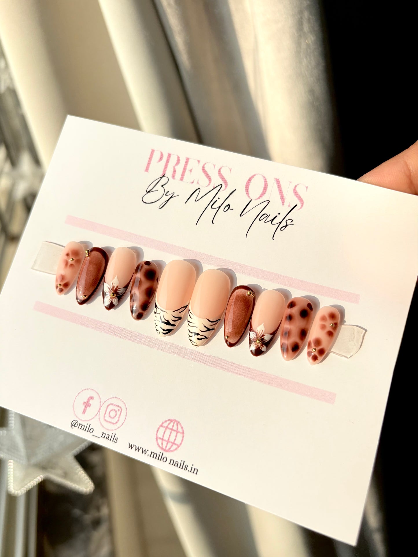 Brown flower with printed nails