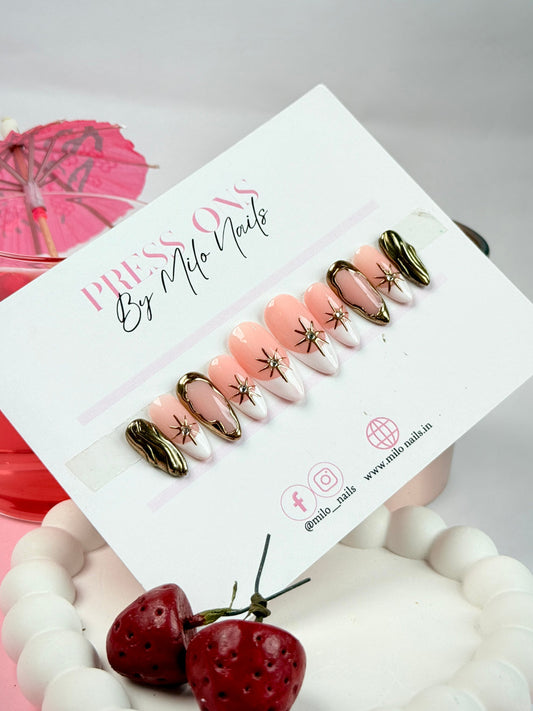 White - golden metallic nails