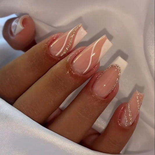 White swirls and glitter nails