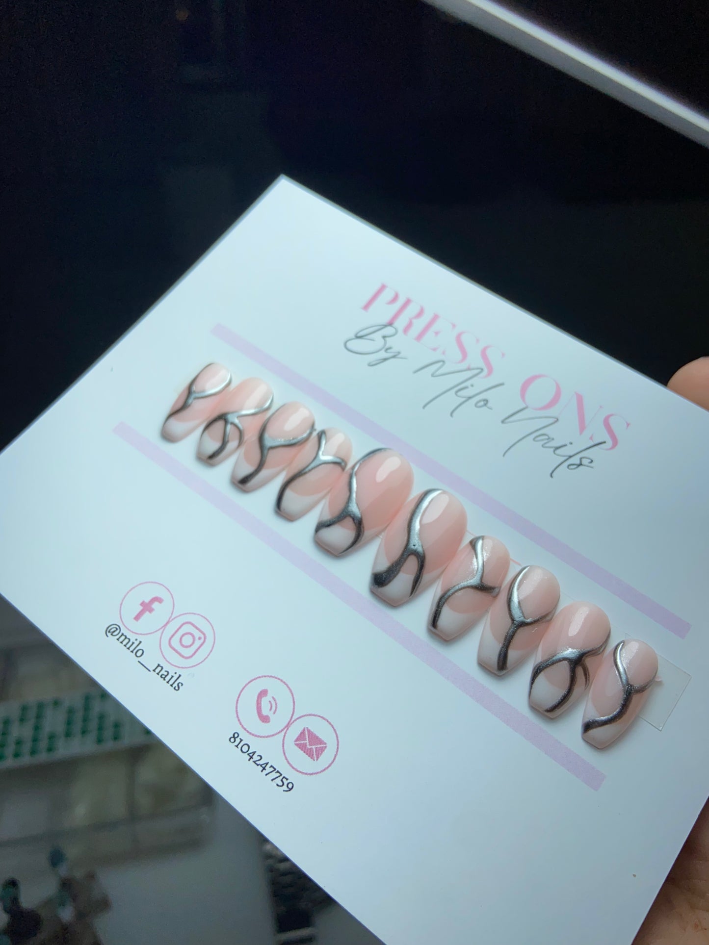 Silver metallic swirls