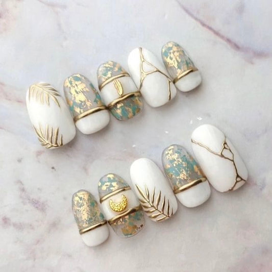 White leafy chrome nails