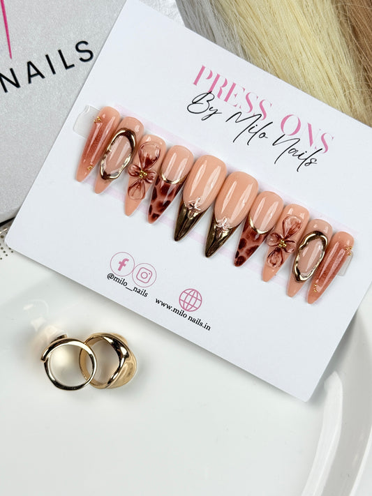 Brown metallic golden nails