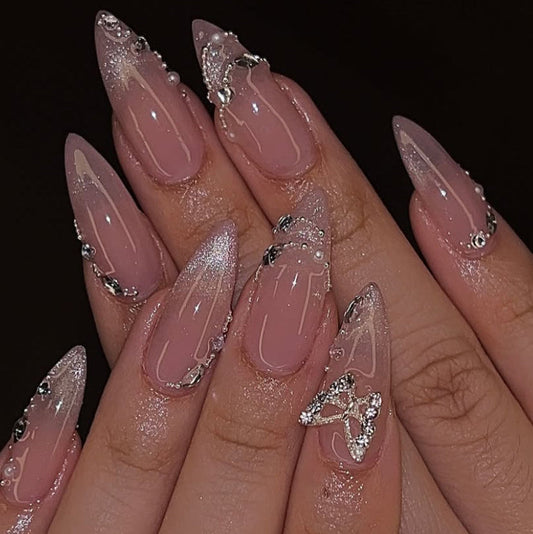 Pink cat eye nails with bow