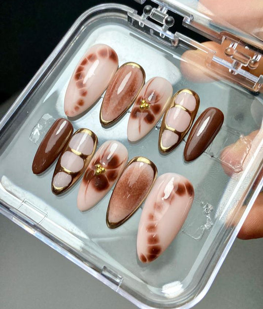Brown greek metallic nails
