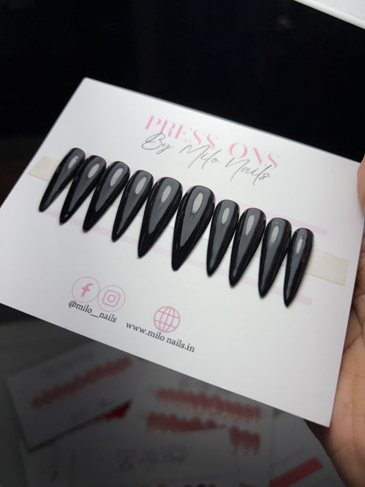 Black switch red nails