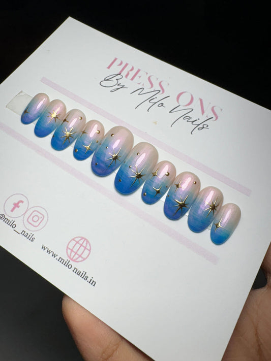 Blue ombre with metallic stars