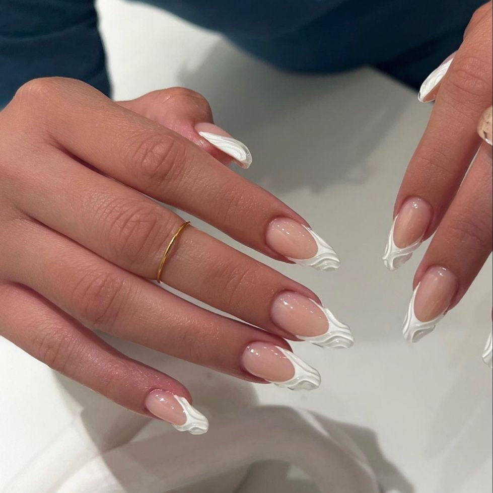 French nail with embosed swirls