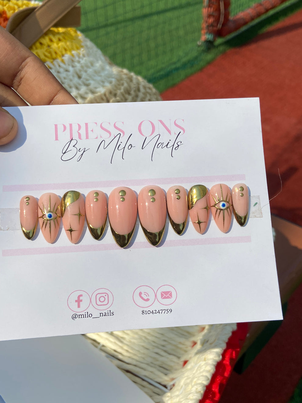 Golden metallic evil eye