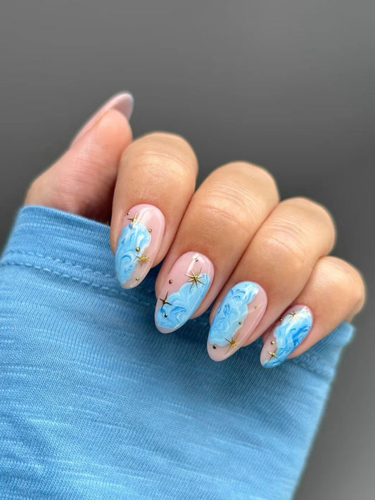 Marble nails with chrome stars