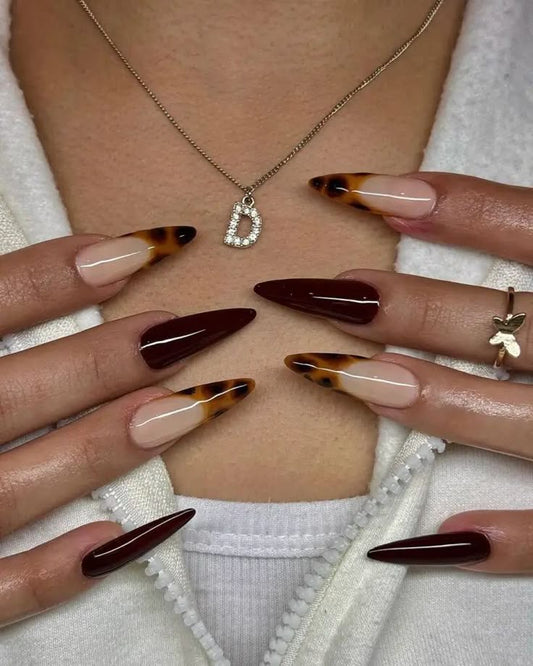 Maroon nails with cheetah print