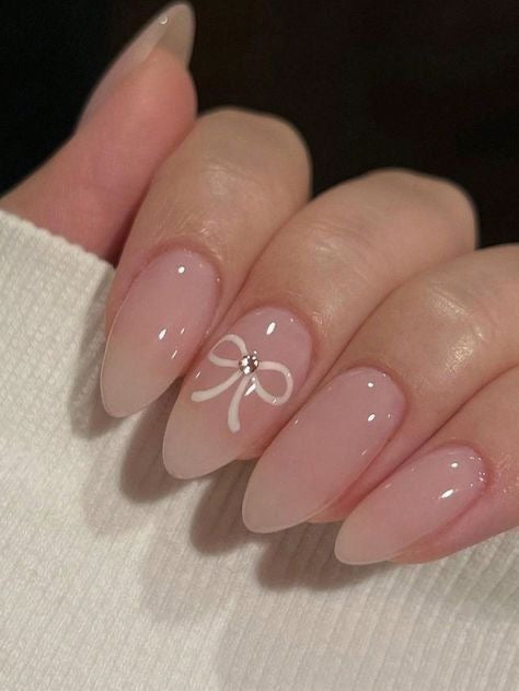 Nude minimal bow nails