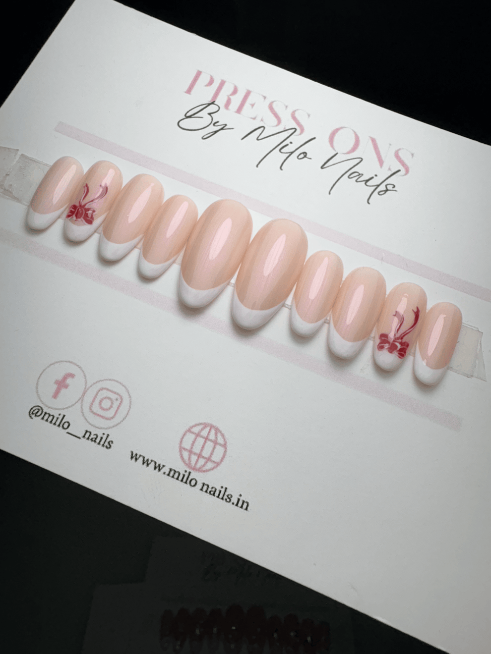 Pink french with bow nails