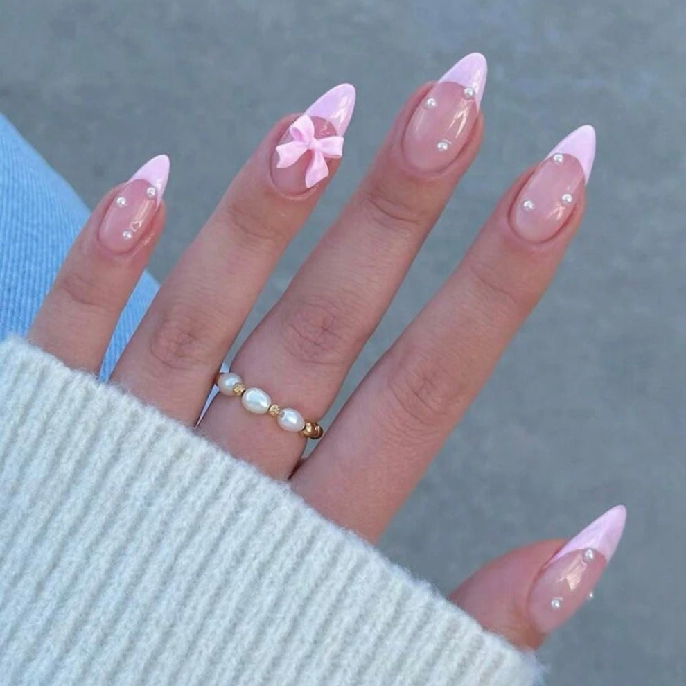 Pink tips with bows and pearl