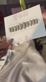 Grey cateye with bow