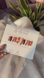 Brown flower with printed nails