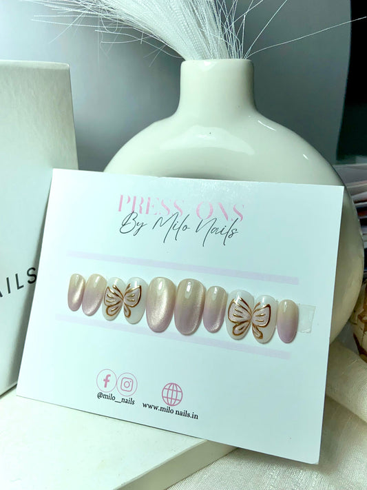 Purple butterfly chrome nails