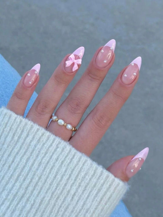 Pink tips with bows and pearl