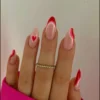 red swirls with hearts press ons / Milo Nails